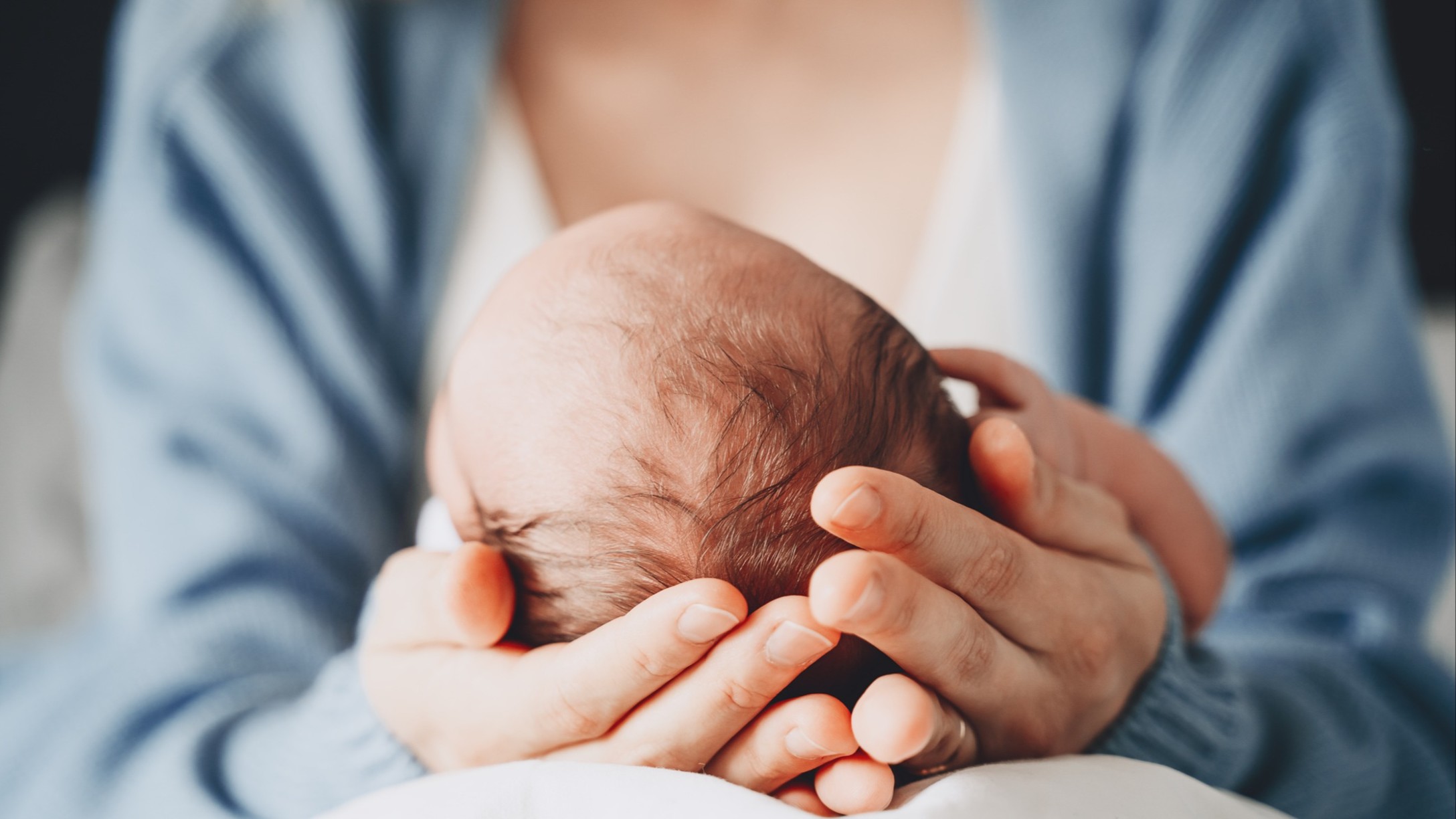 Parent holding baby