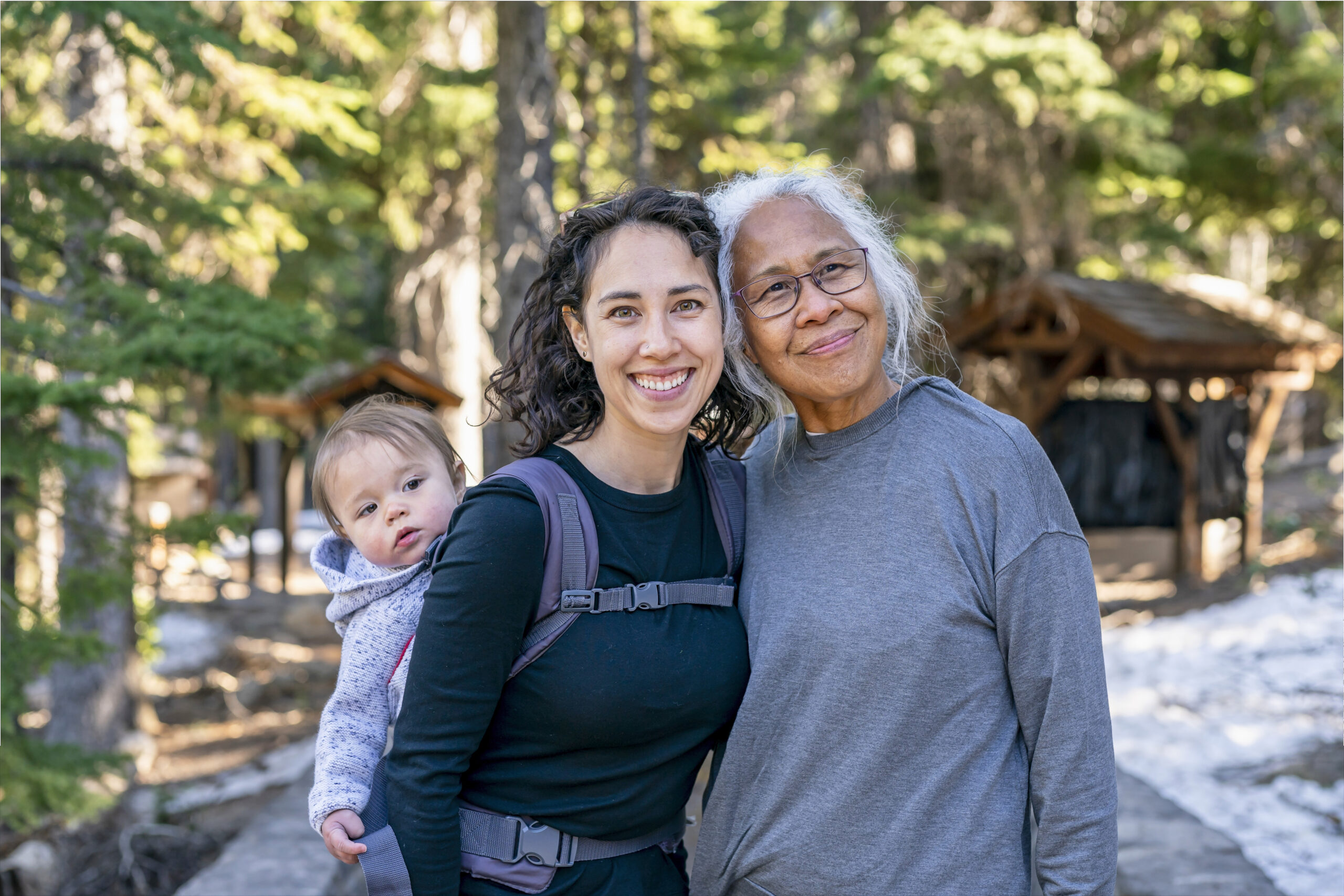 Happy multi-generation family enjoying nature hike