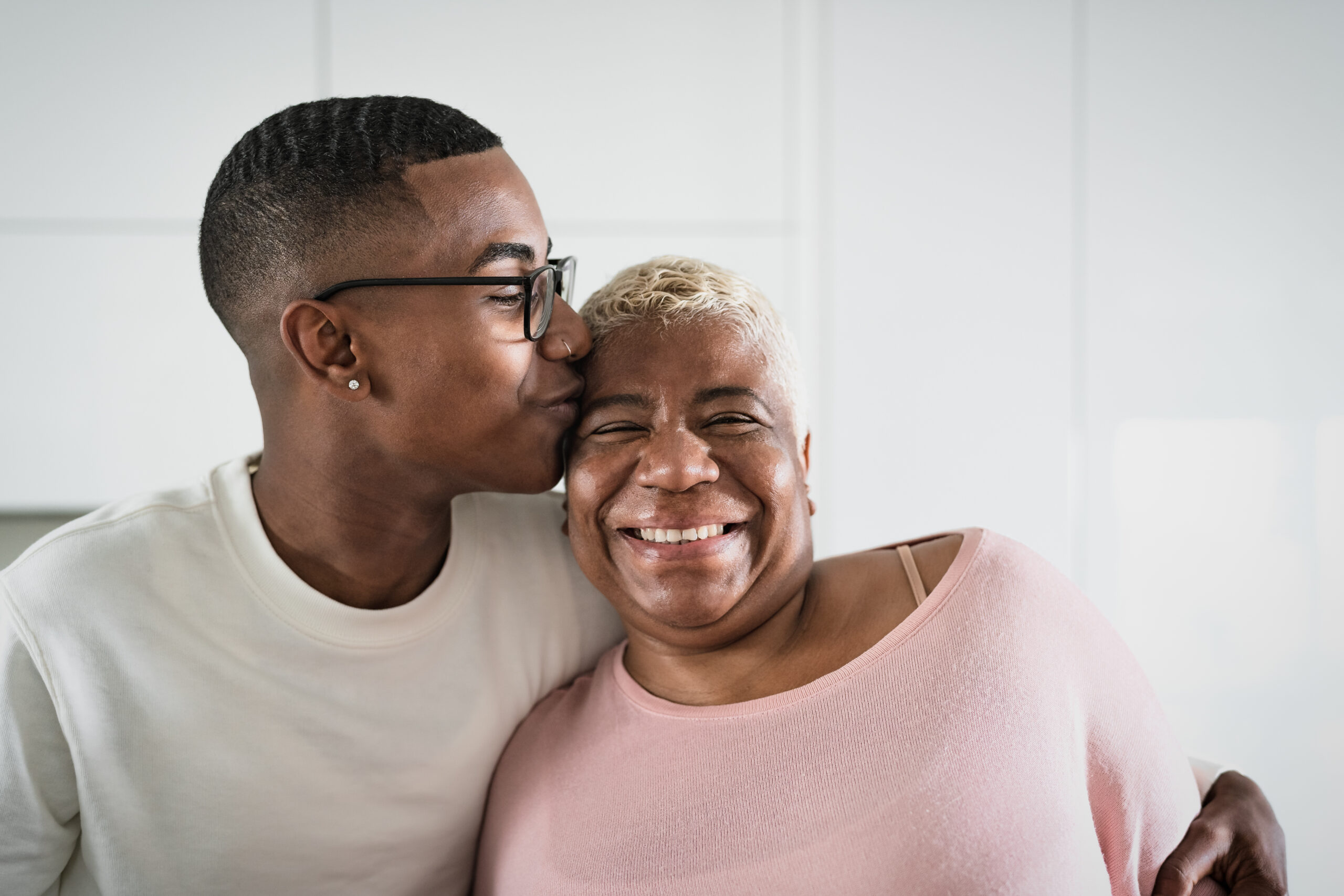 Happy Hispanic mother and son portrait - Parents love and unity concept