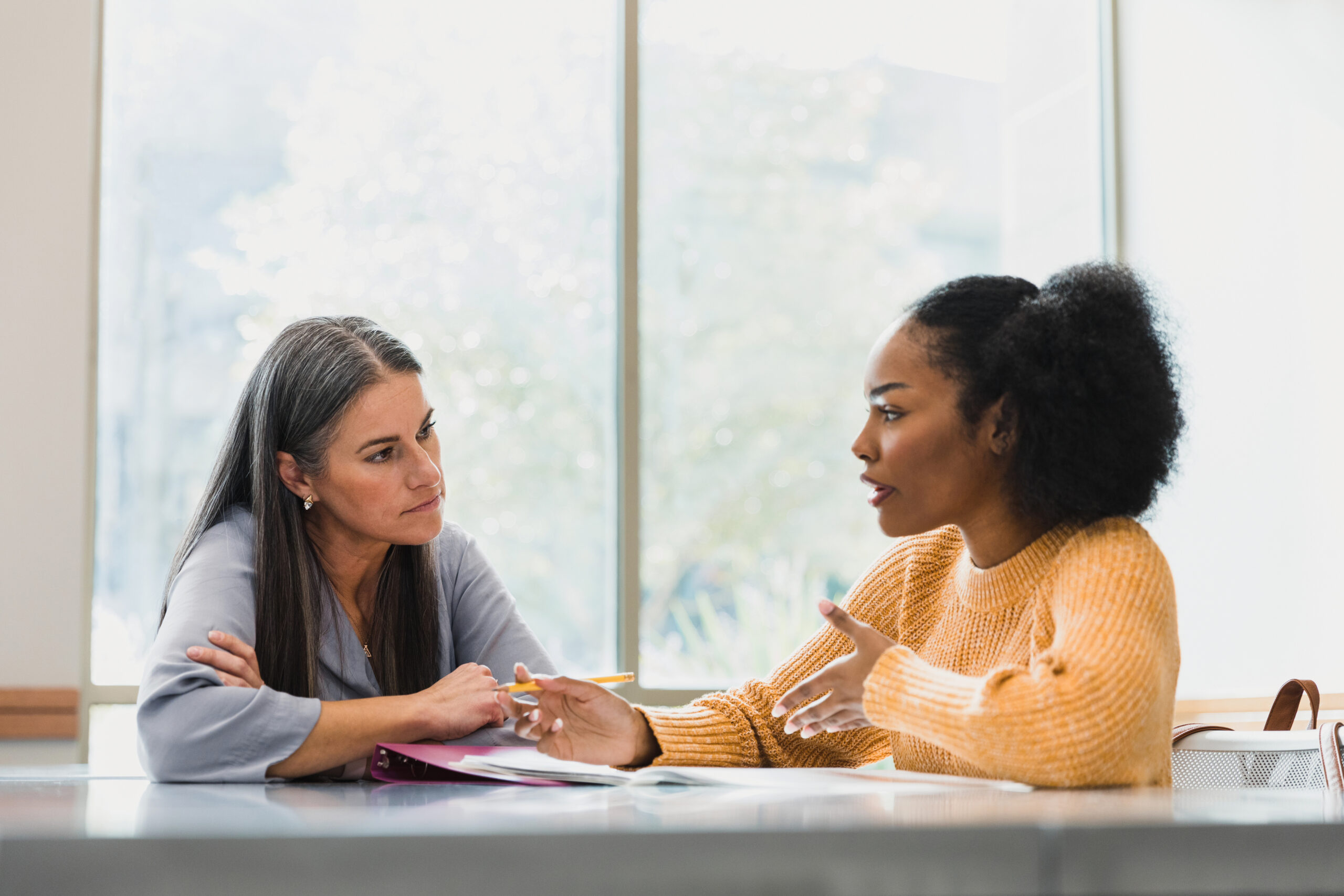 Teacher focuses on her student