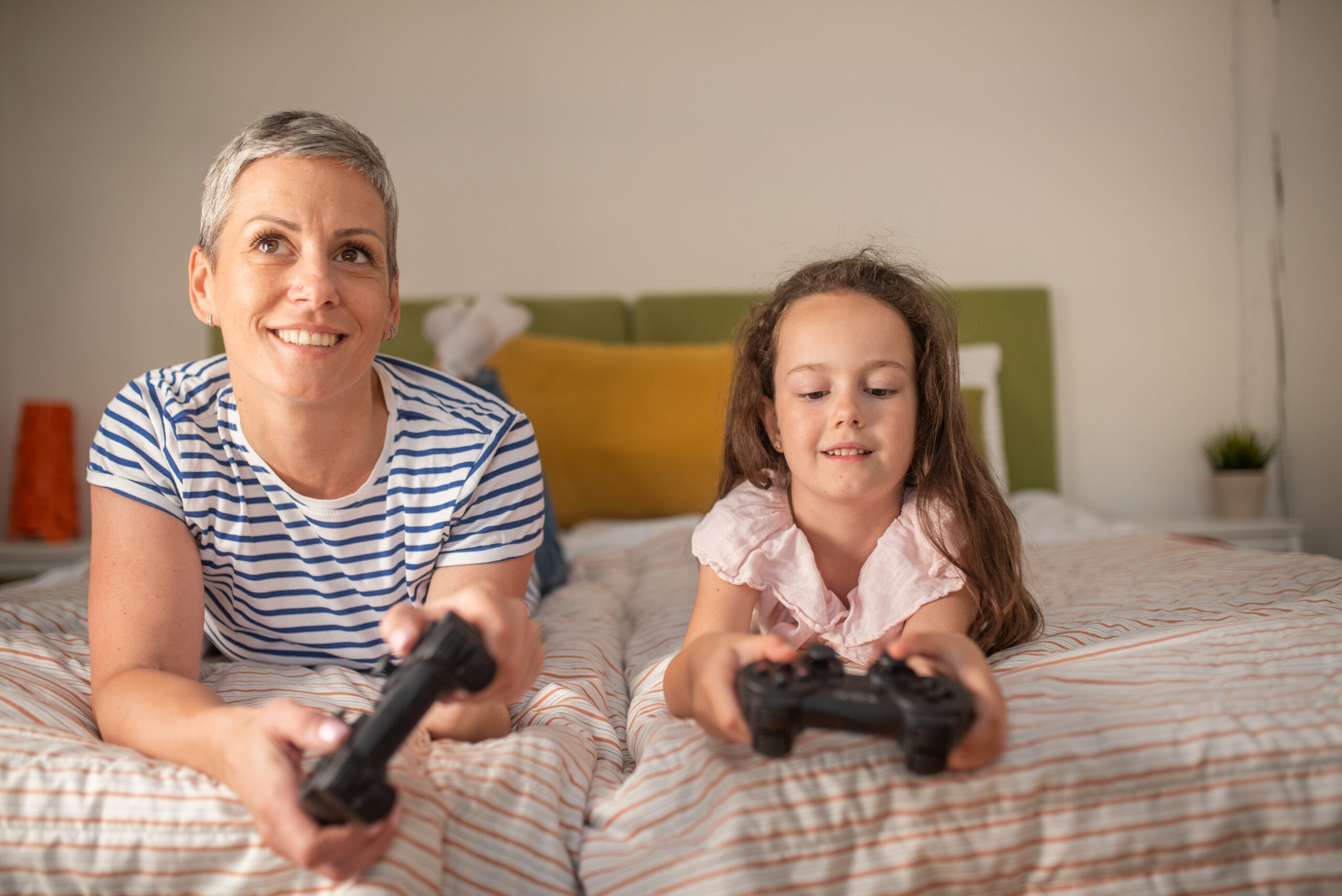 Mother and daughter having fun at home s