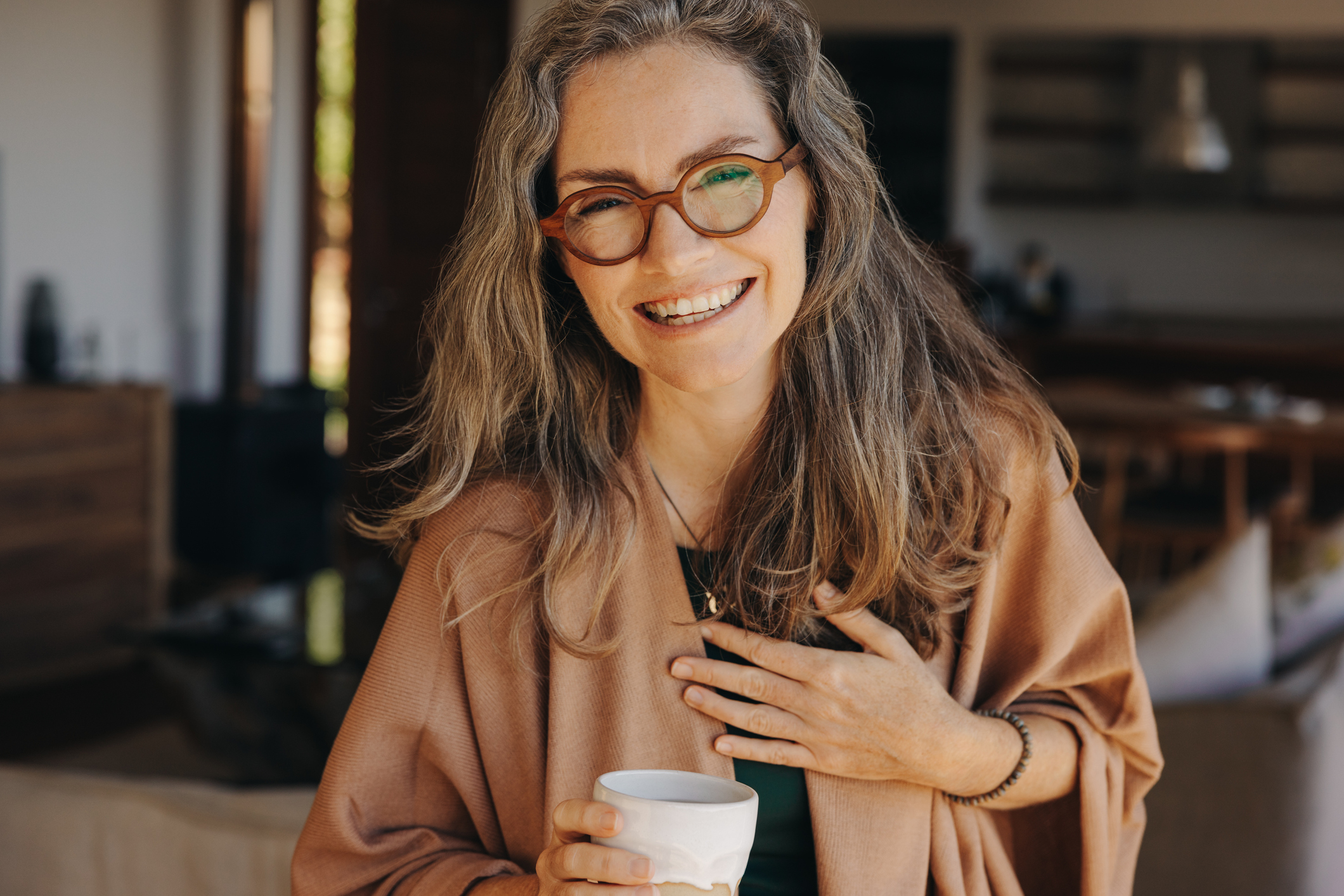 Cheerful senior woman smiling at the camera