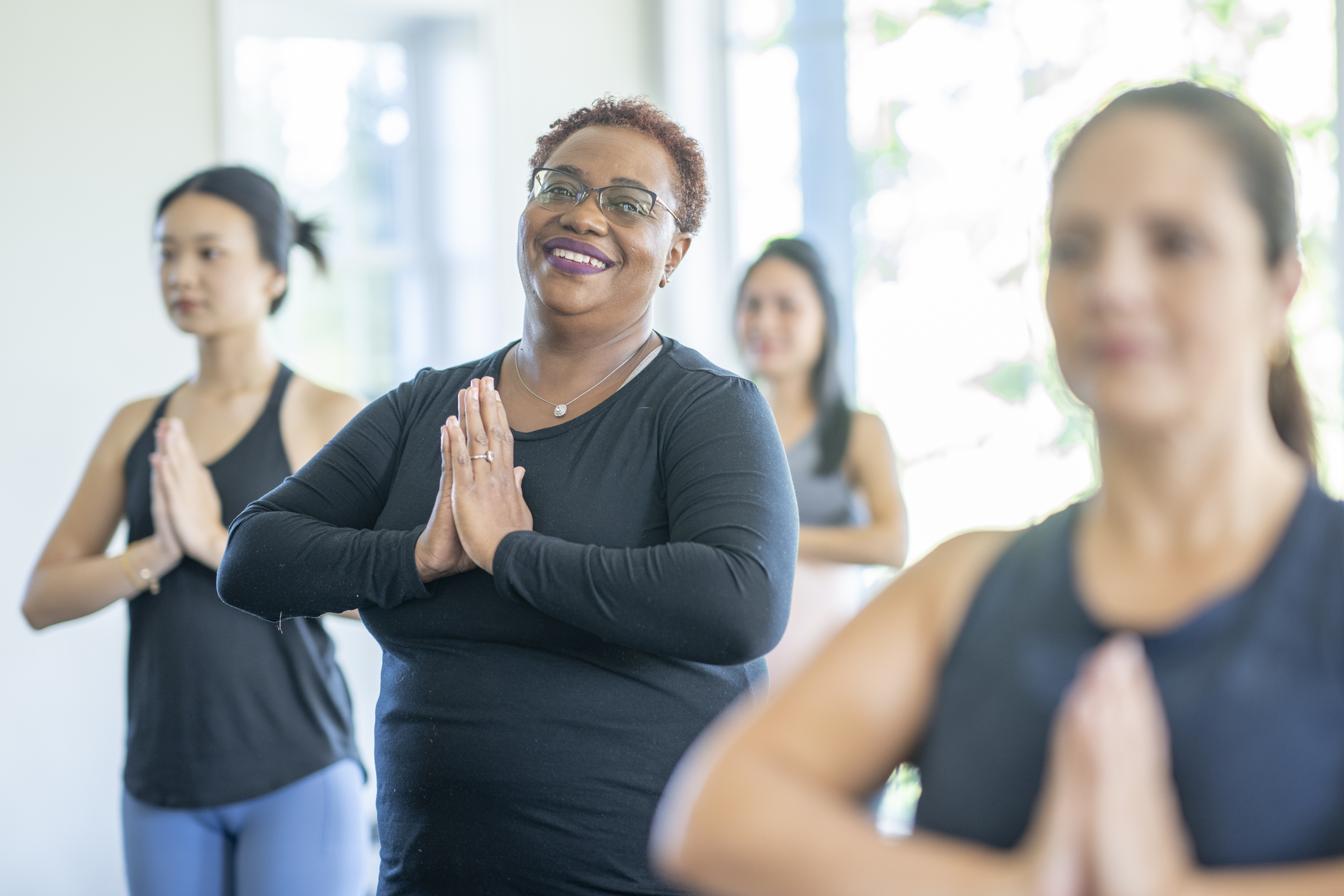 Women Standing to Meditate