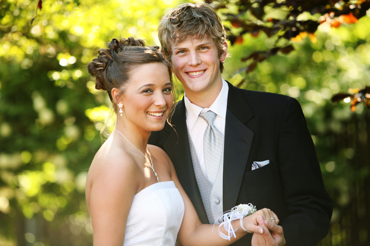 Young Couple Posing for Prom Photos