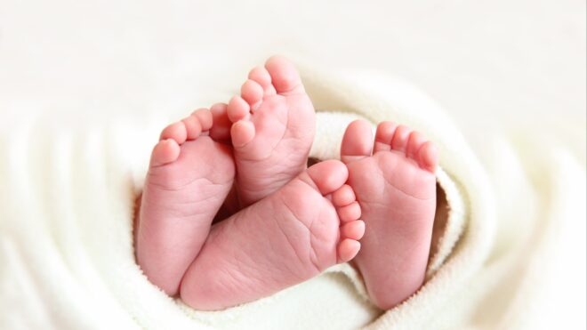 Newborn twin feet