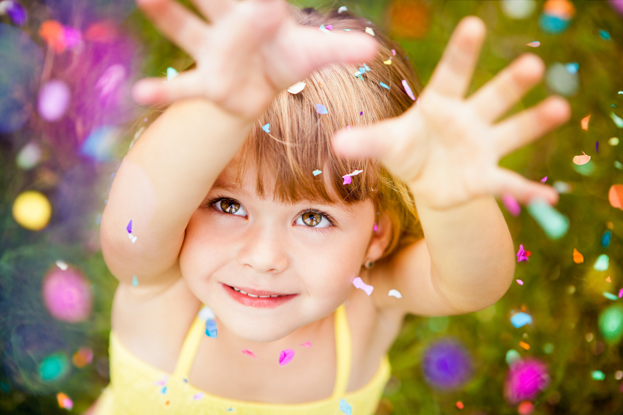 Confetti Falling On Little Girl