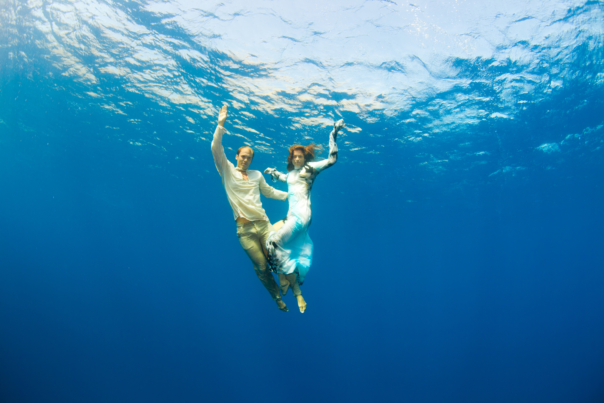 happy couple underwater