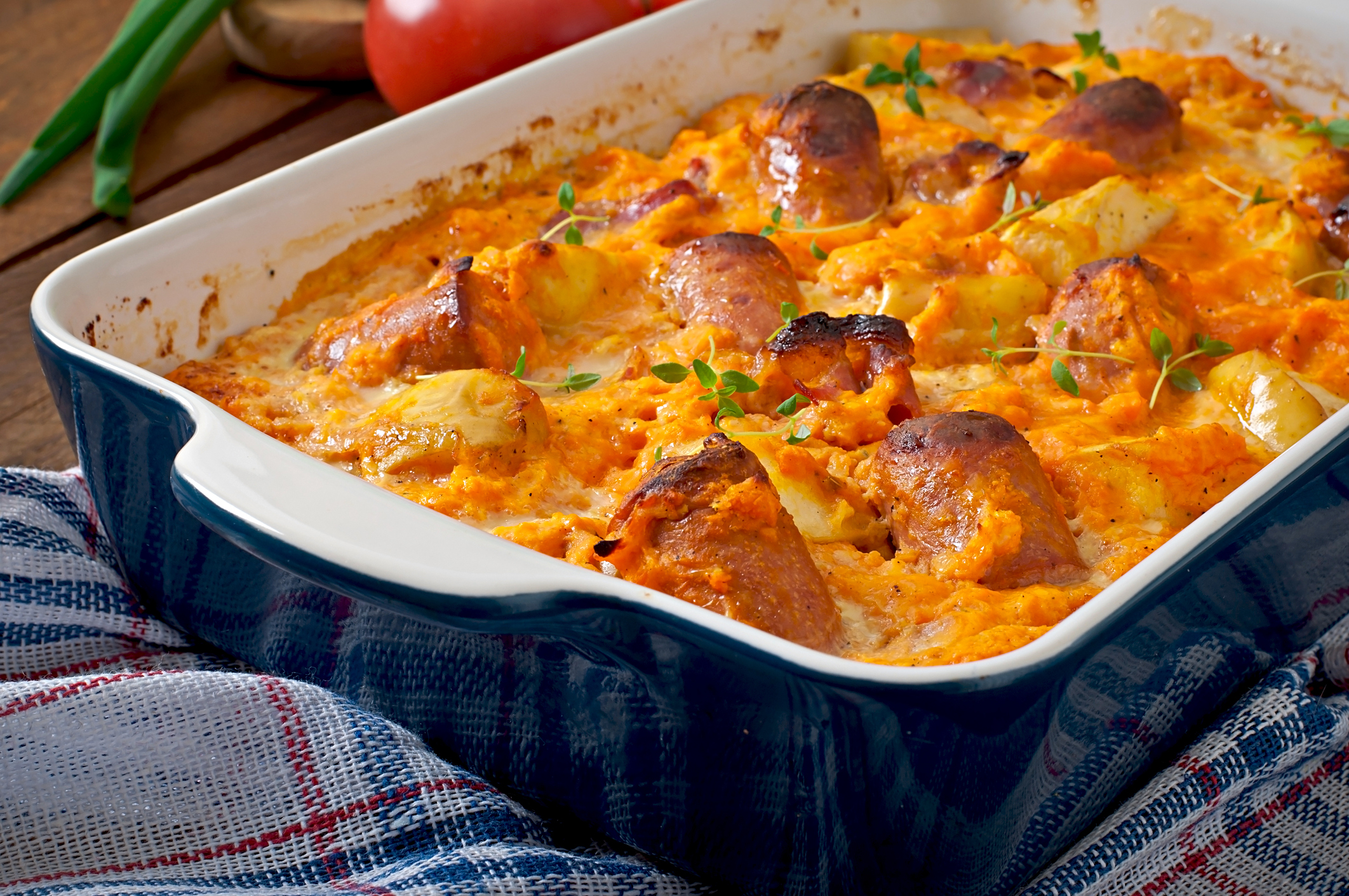 Casserole with sausage, bacon and apples