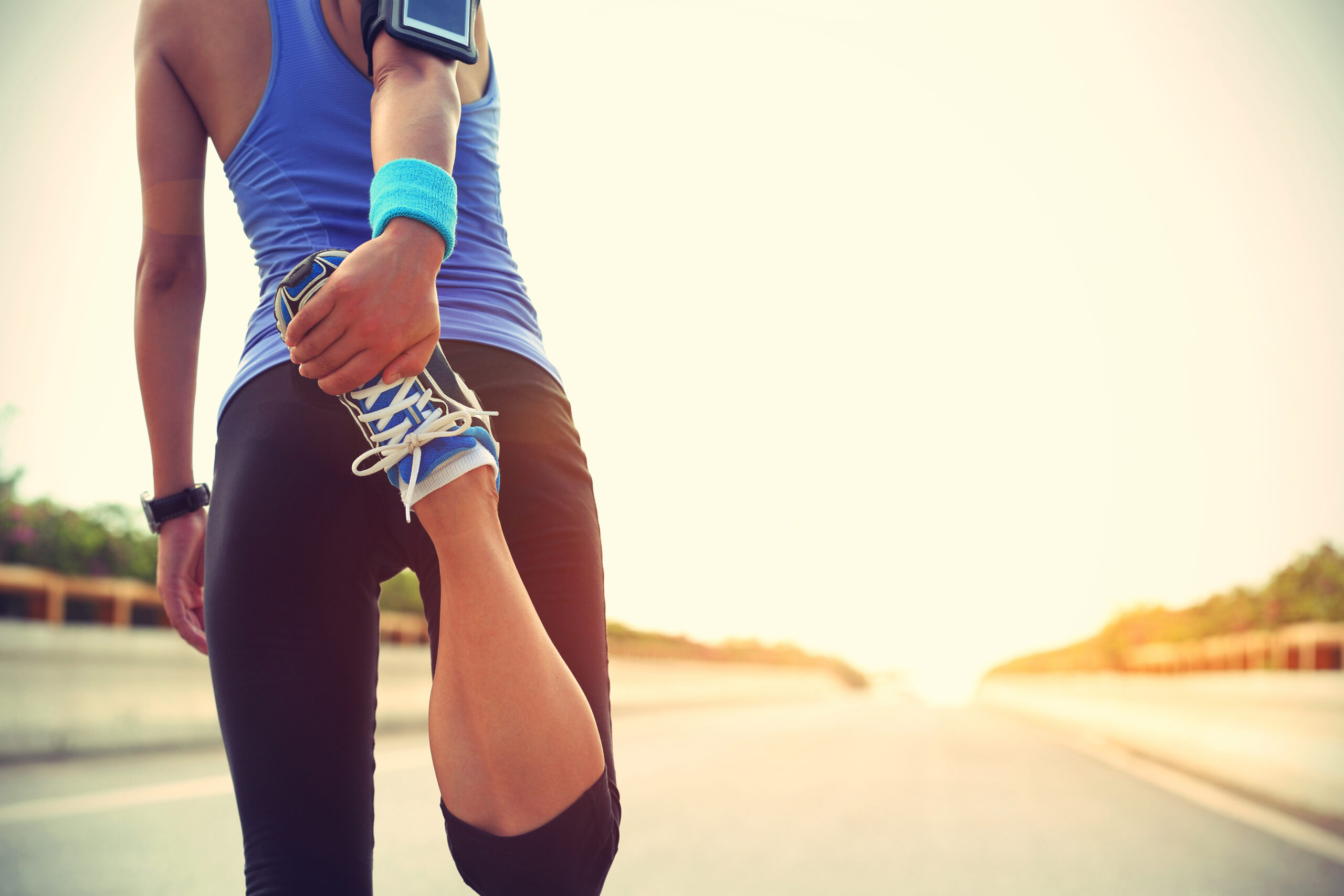 young woman runner warm up outdoor