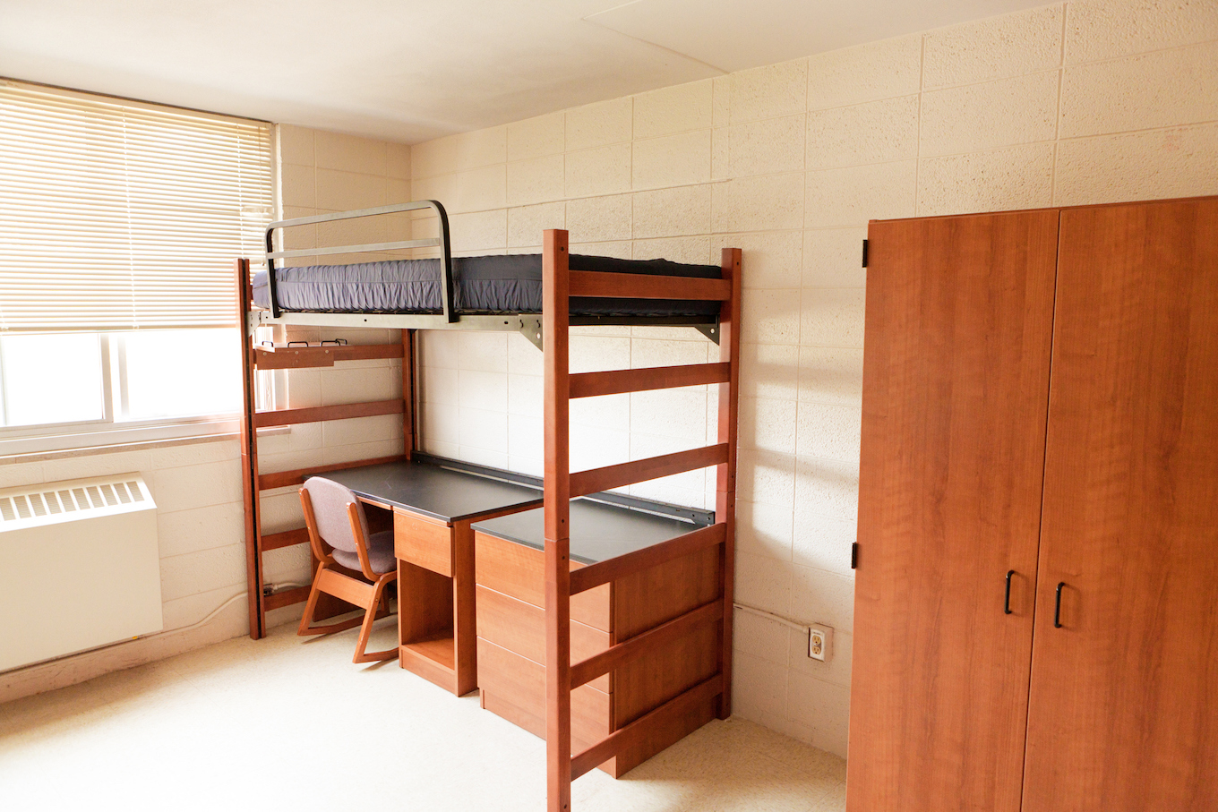 Empty University College Dorm Room with Bunkbed, Desk and Closet