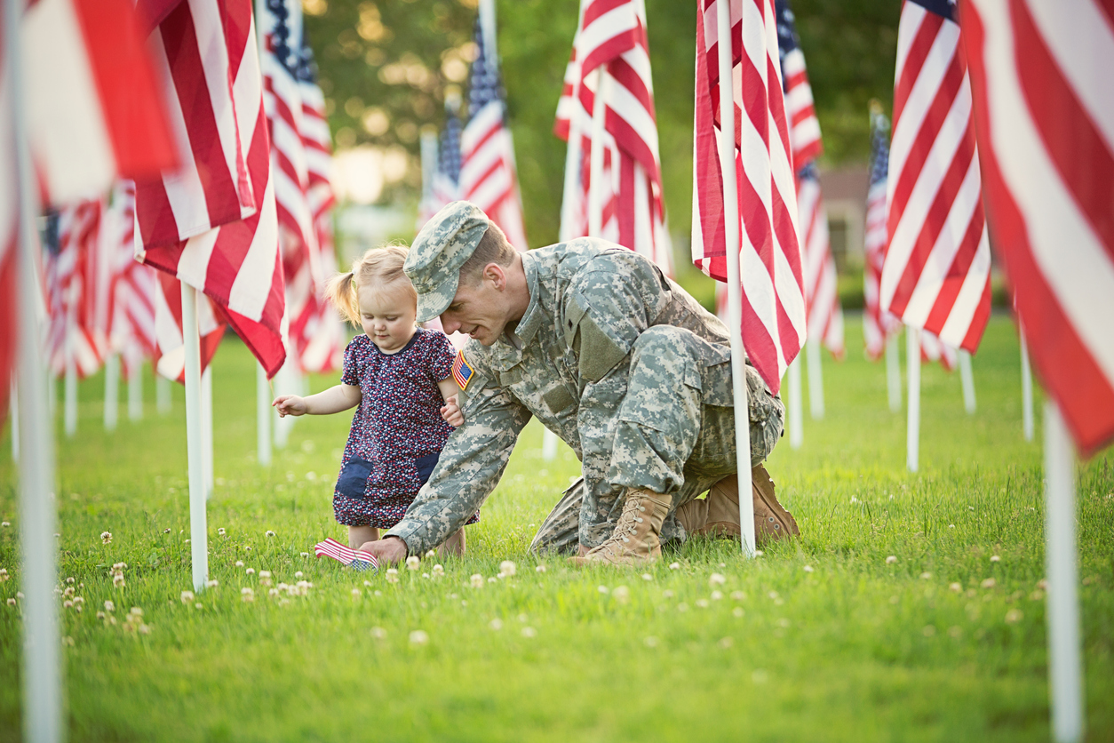 American soldier with daughter