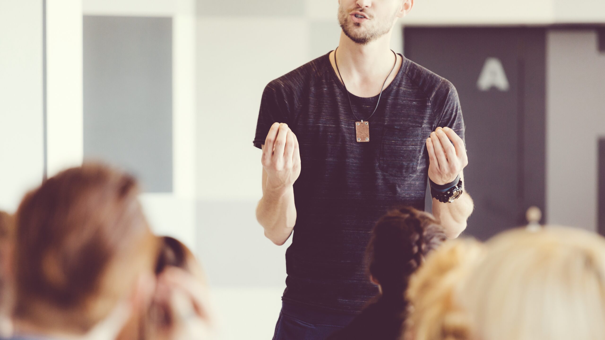 Teacher standing at front of class