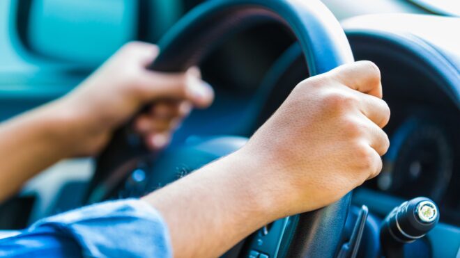 Hands on steering wheel