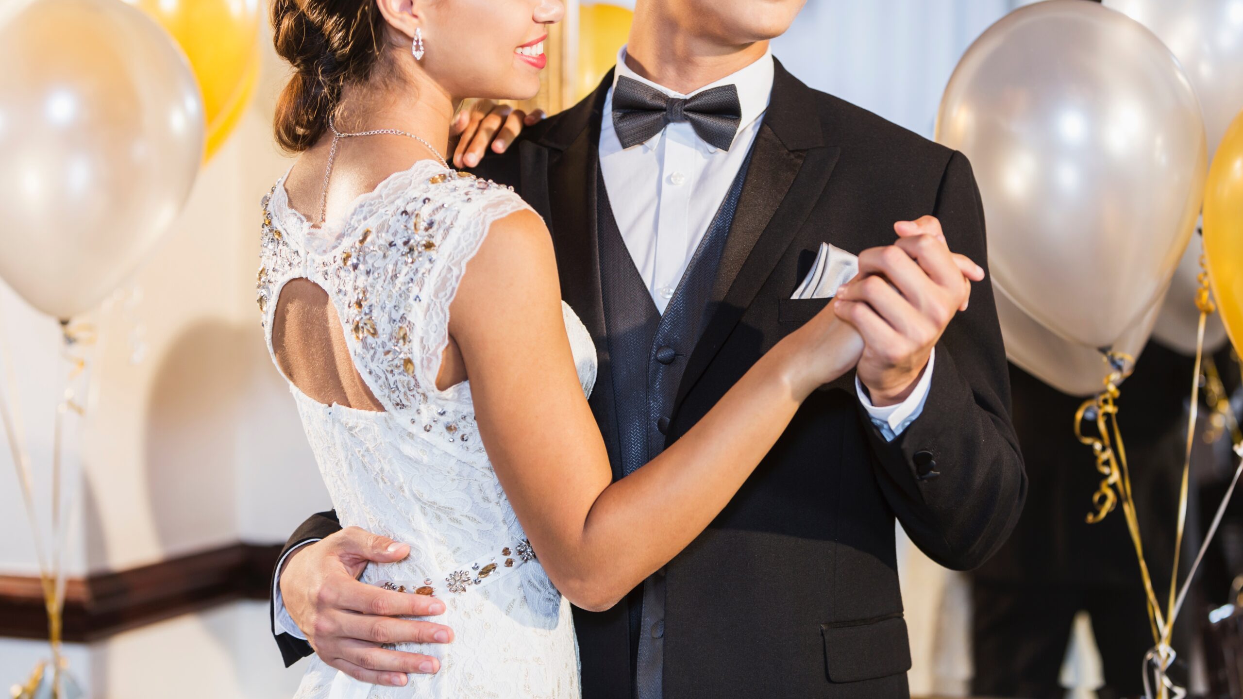 Teens dancing at prom