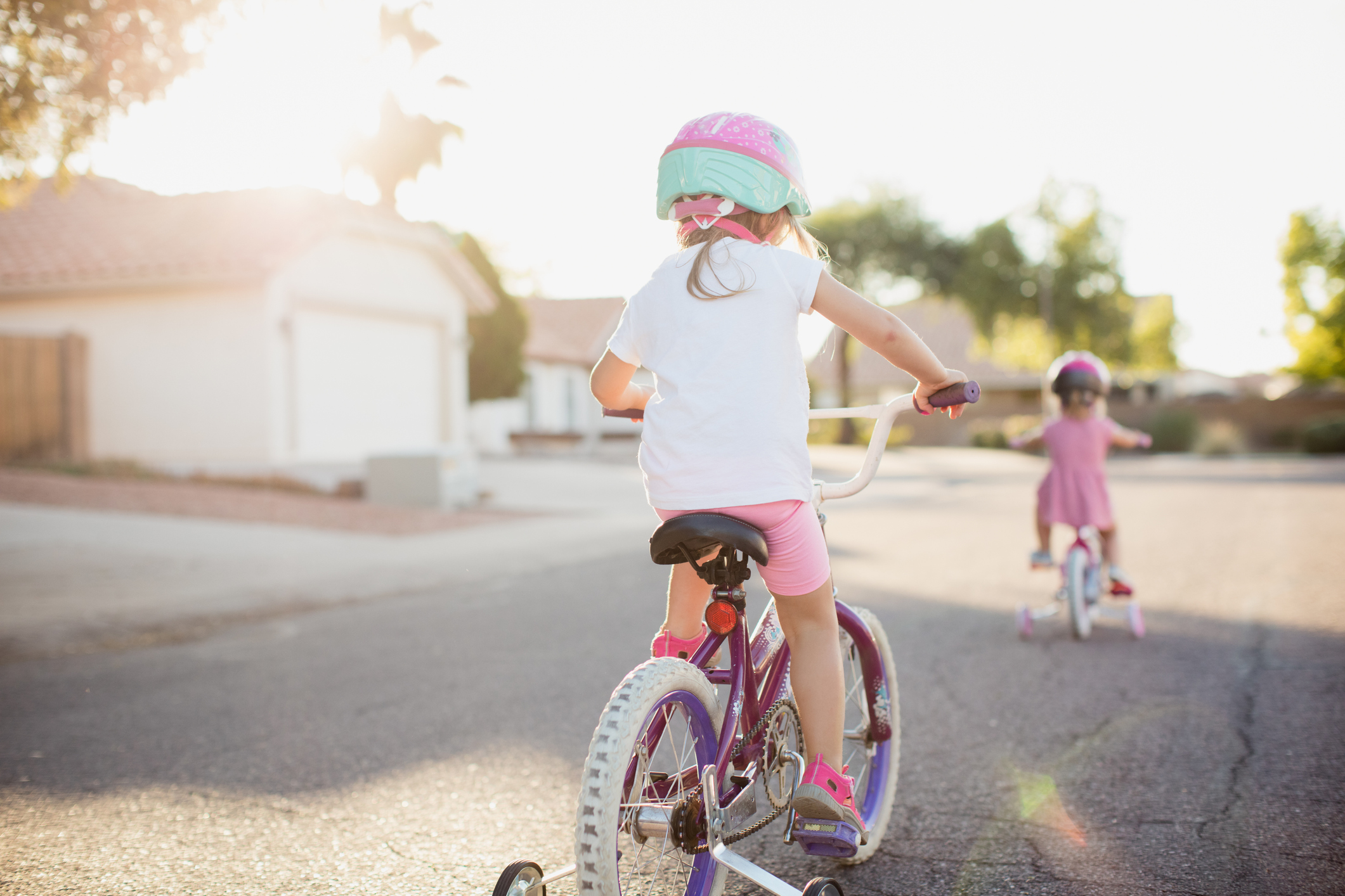 Young girls on bicycles