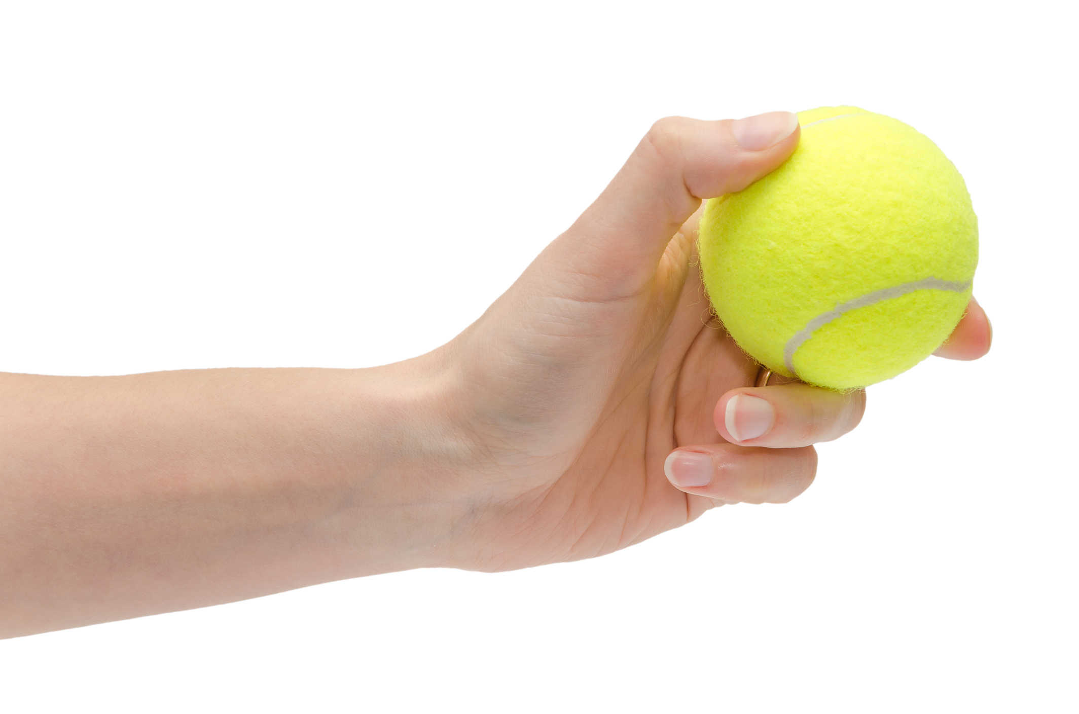 hand of young girl holding tennis ball.