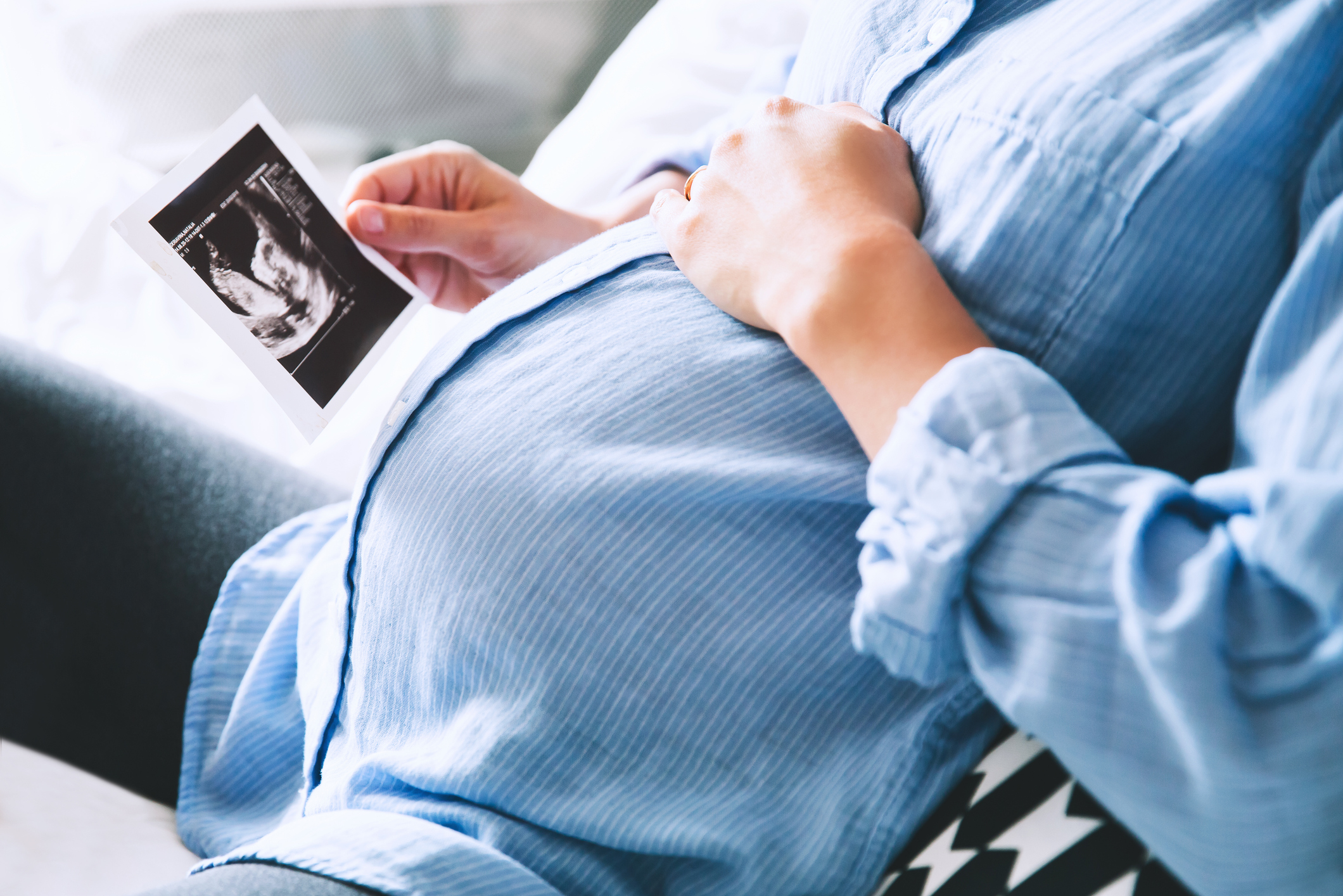 Beautiful pregnant woman at home.