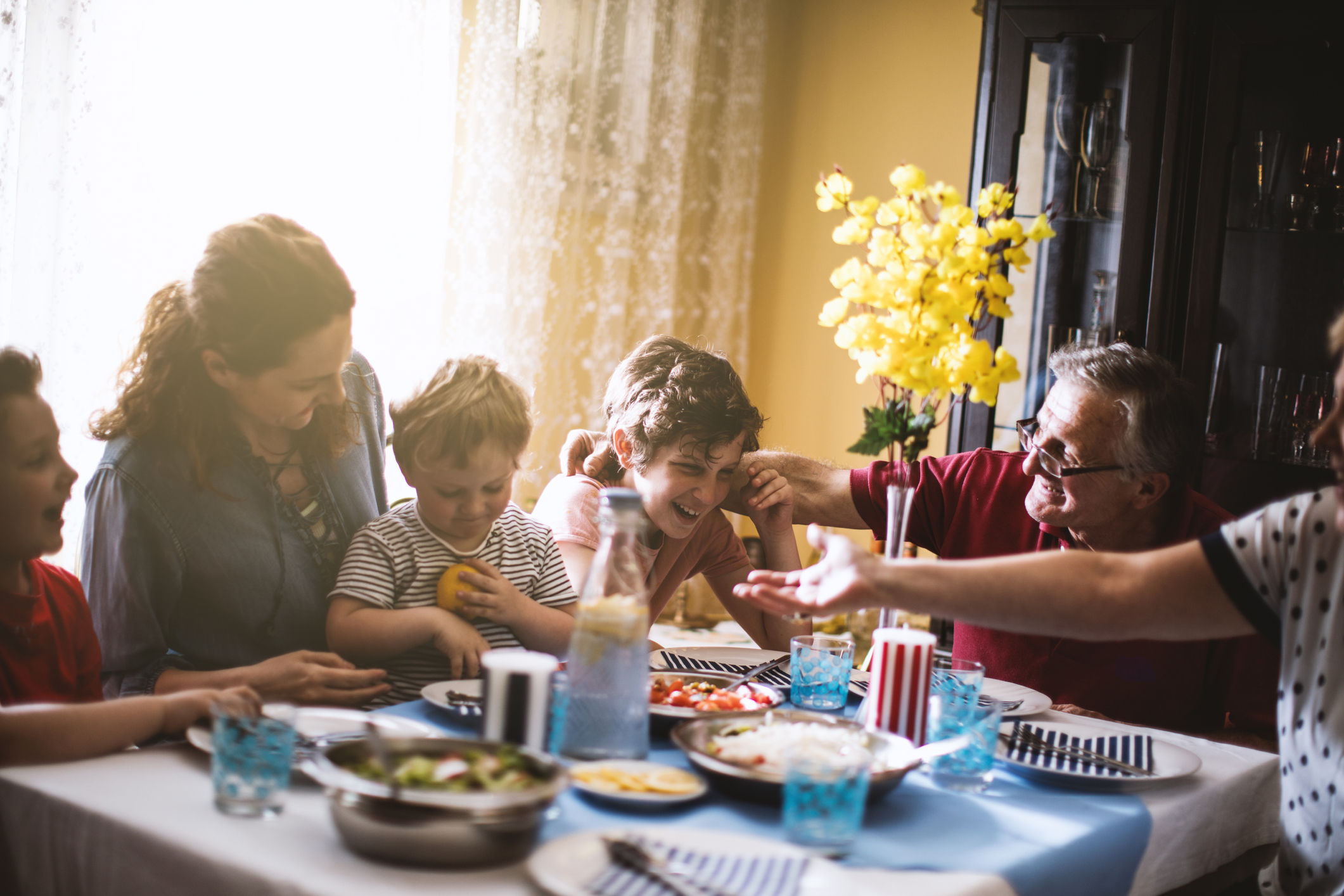 Multi generation family dinner