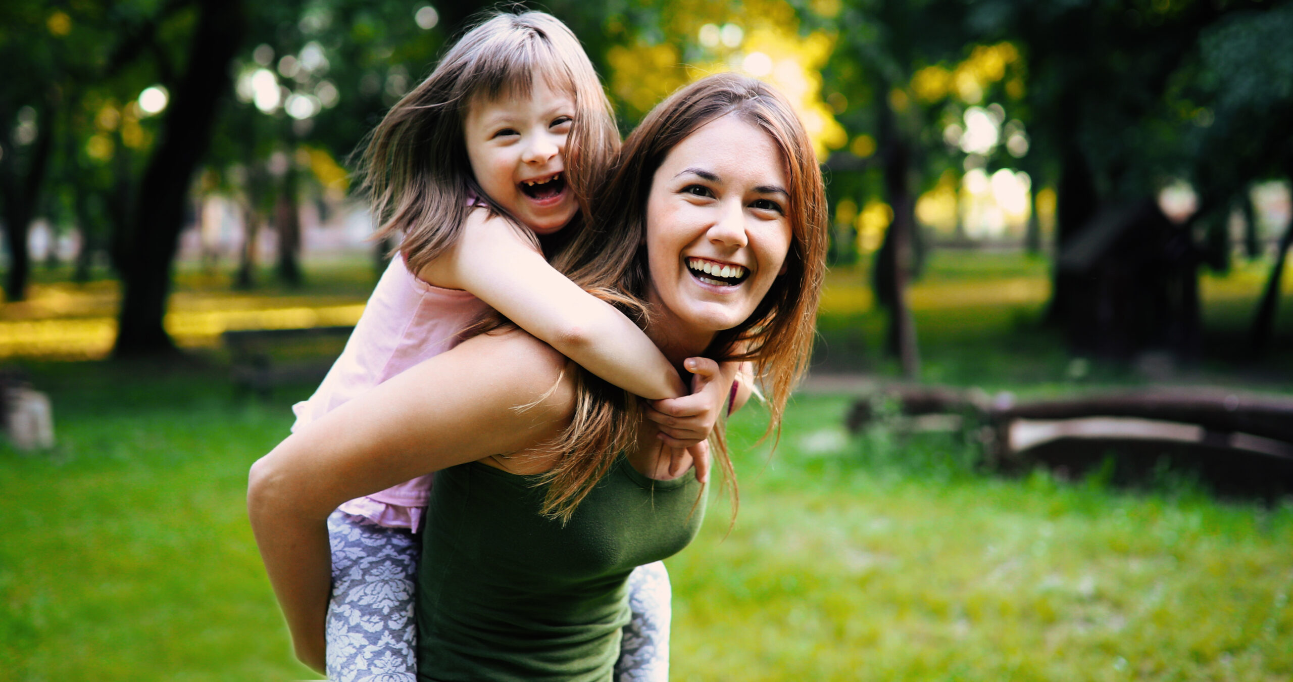 Little girl with special needs enjoy spending time with mother