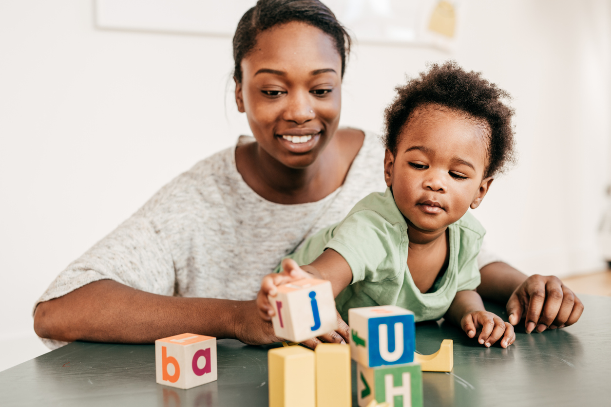 Mom And Toddler Play With Blocks