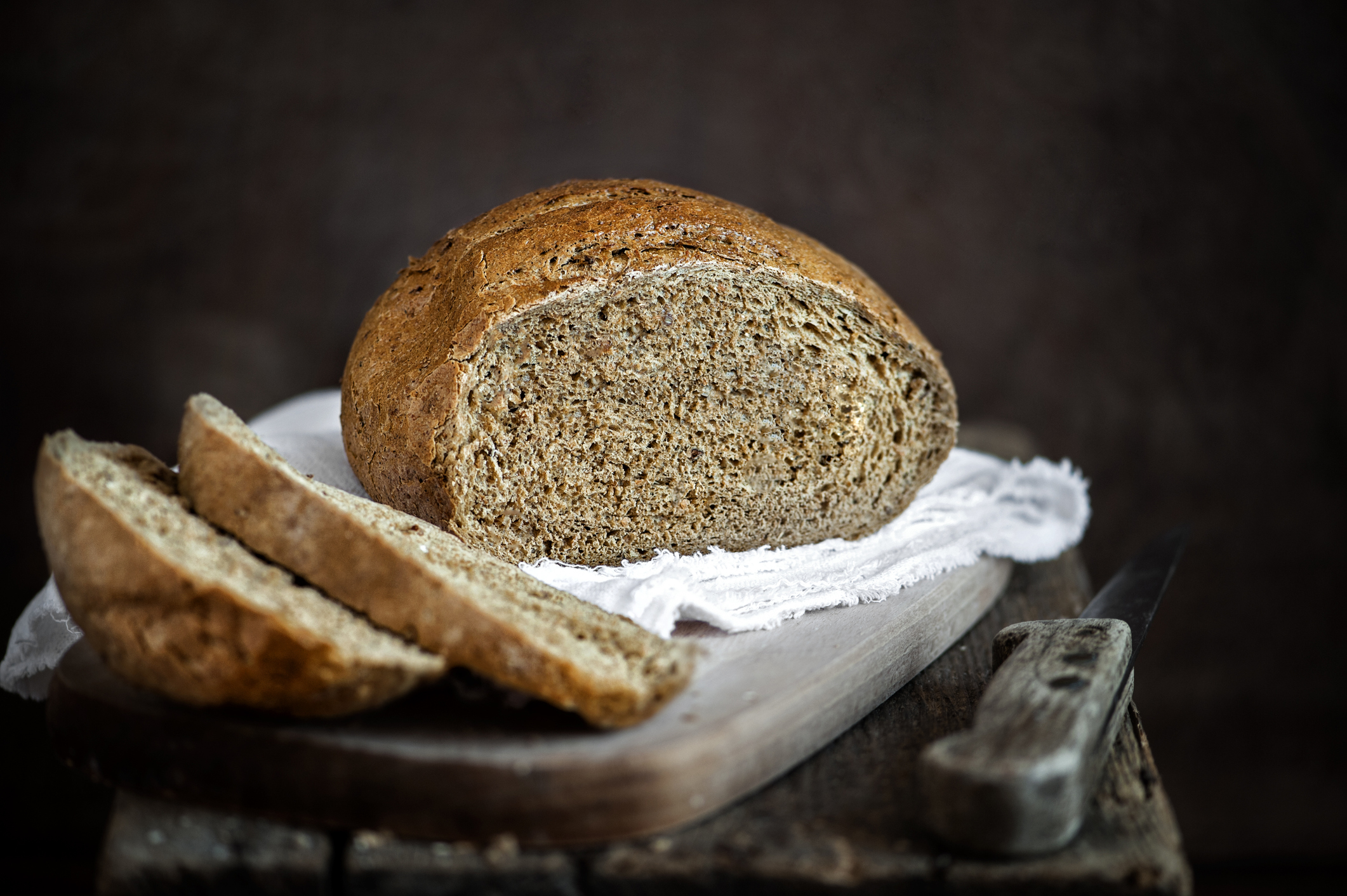 Freshly baked bread on a rustic background