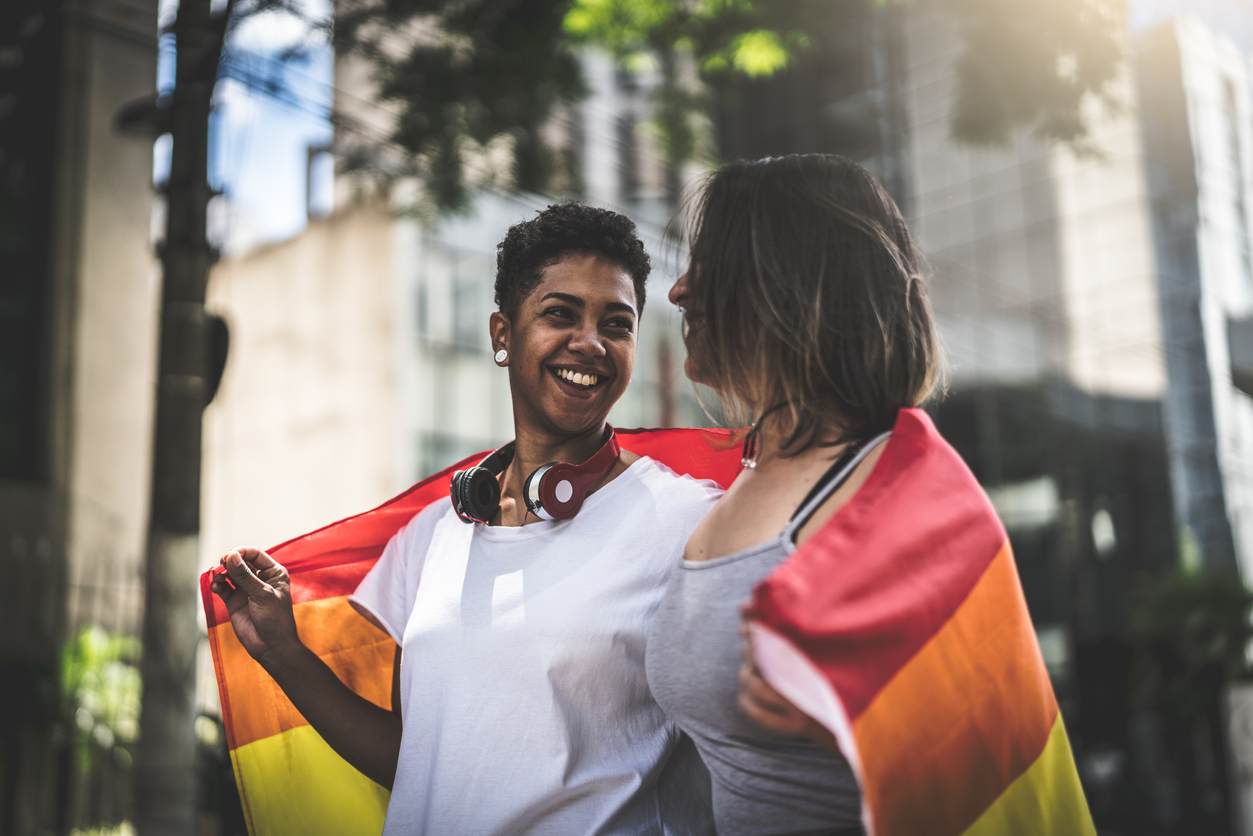 Lesbian Couple with Rainbow Flag