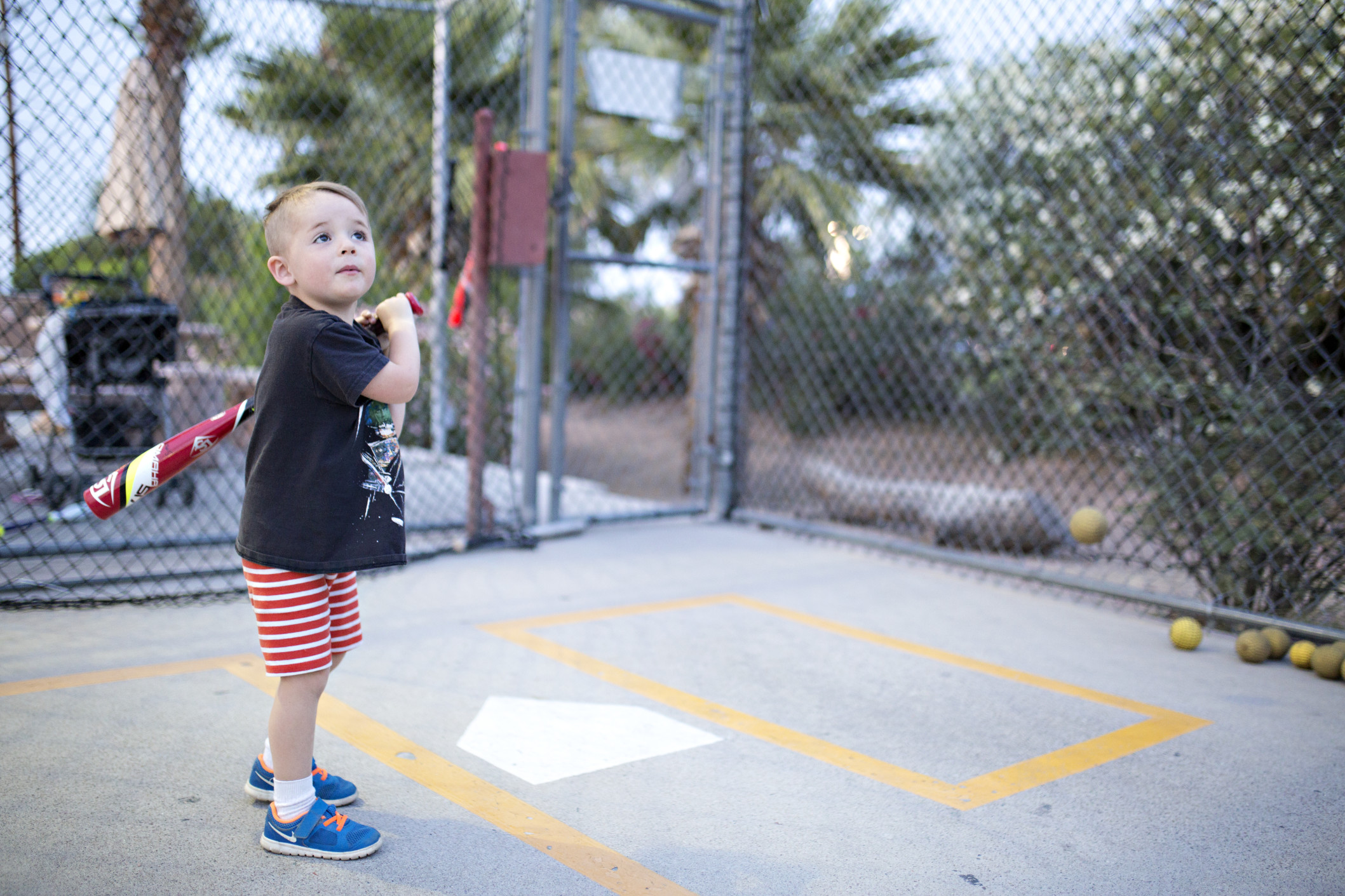 kids-playing-baseball-at-a-batting-range_t20_b8BJ9X.jpg