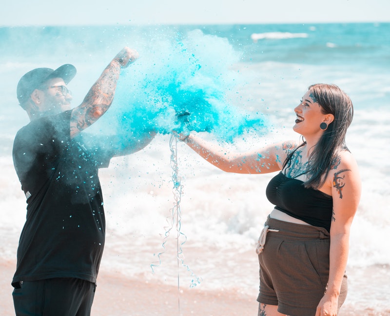 man-and-woman-standing-on-seashore-2685039.jpg