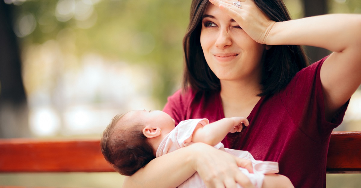 Stressed Anxious Mother Holding Newborn Daughter