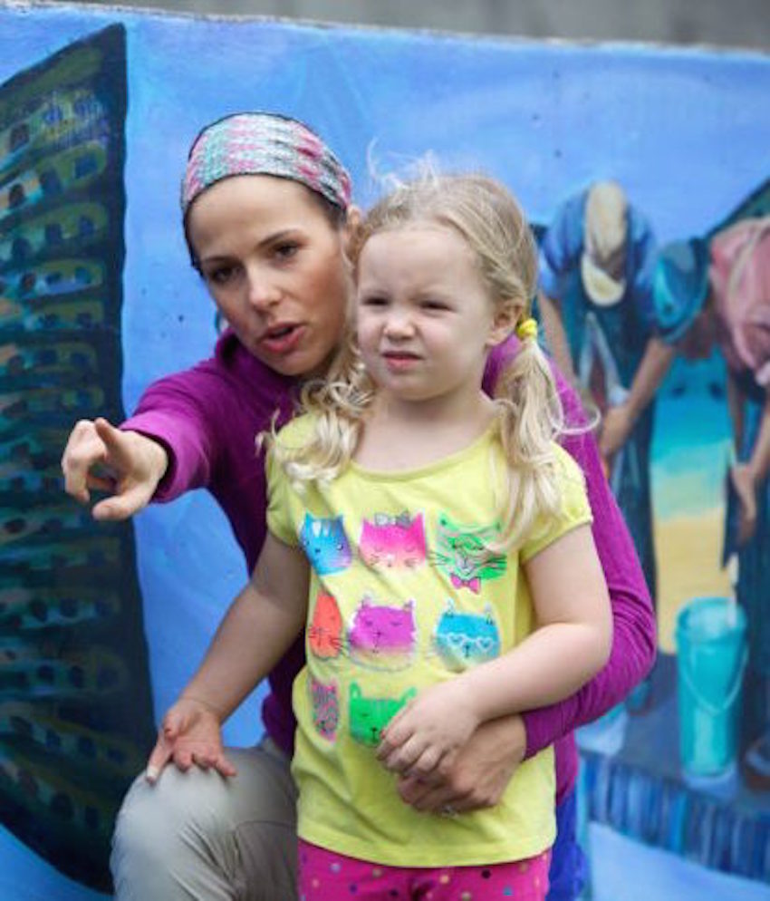 Mother daughter enjoying an exhibition