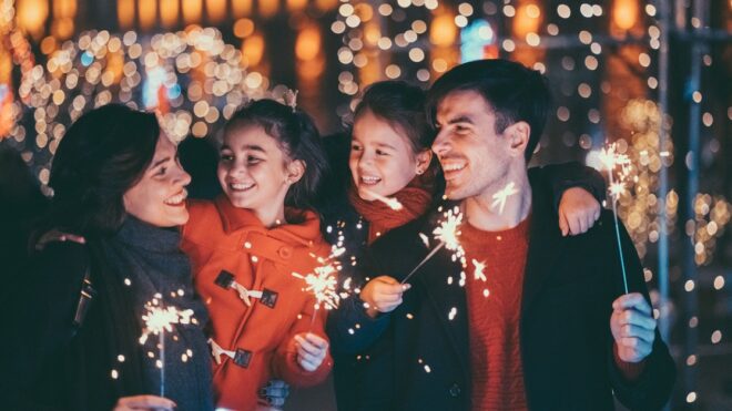 Happy family celebrating Christmas and New Year together