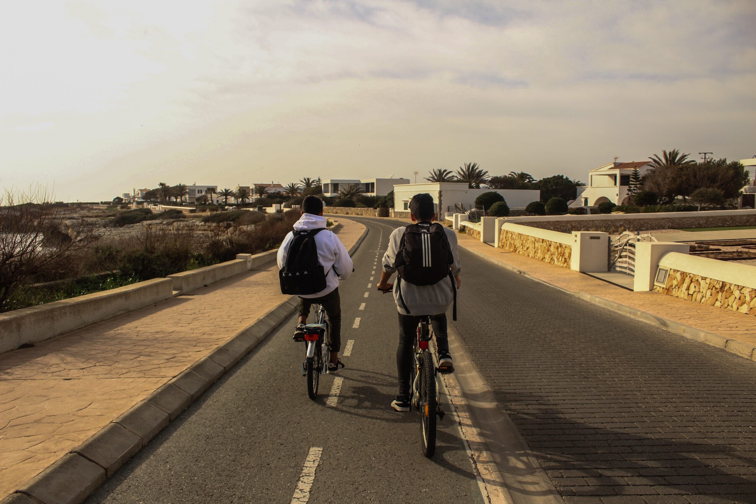 people-riding-bicycles-on-the-road-3833130.jpg