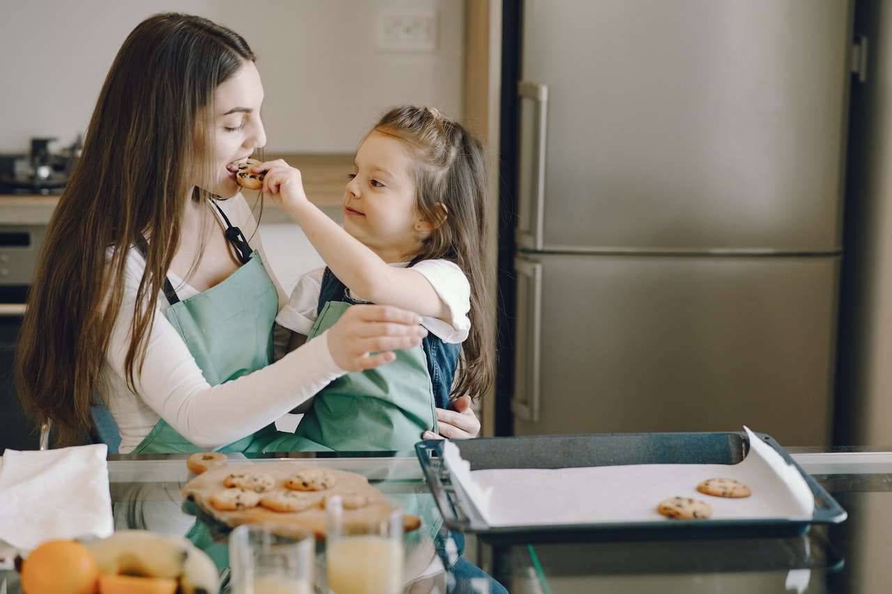 photo-of-woman-eating-cookie-4149026.jpg