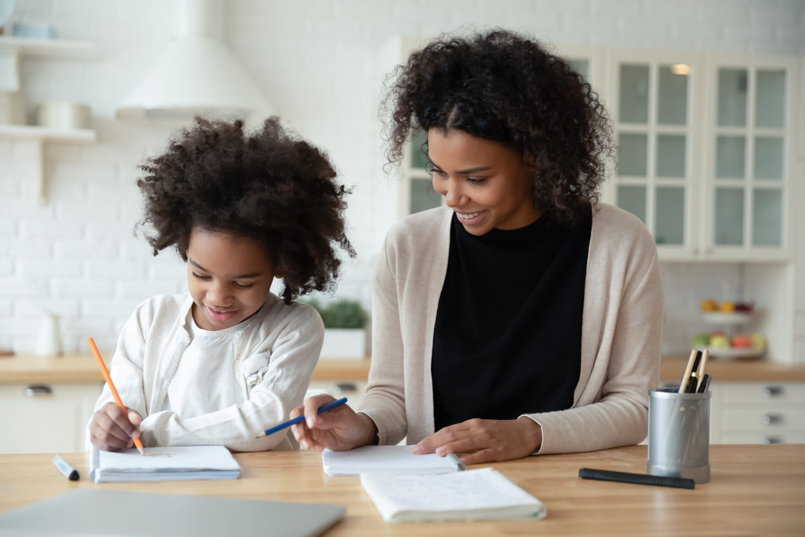 Happy,Little,Adorable,African,American,Girl,Enjoying,Studying,With,Mommy's