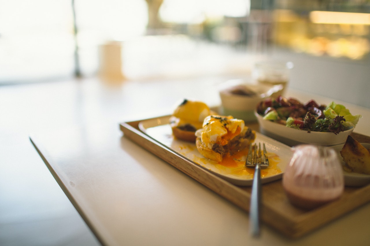 vegetable-salad-and-breakfast-sliders-on-brown-wooden-tray-3192171.jpg