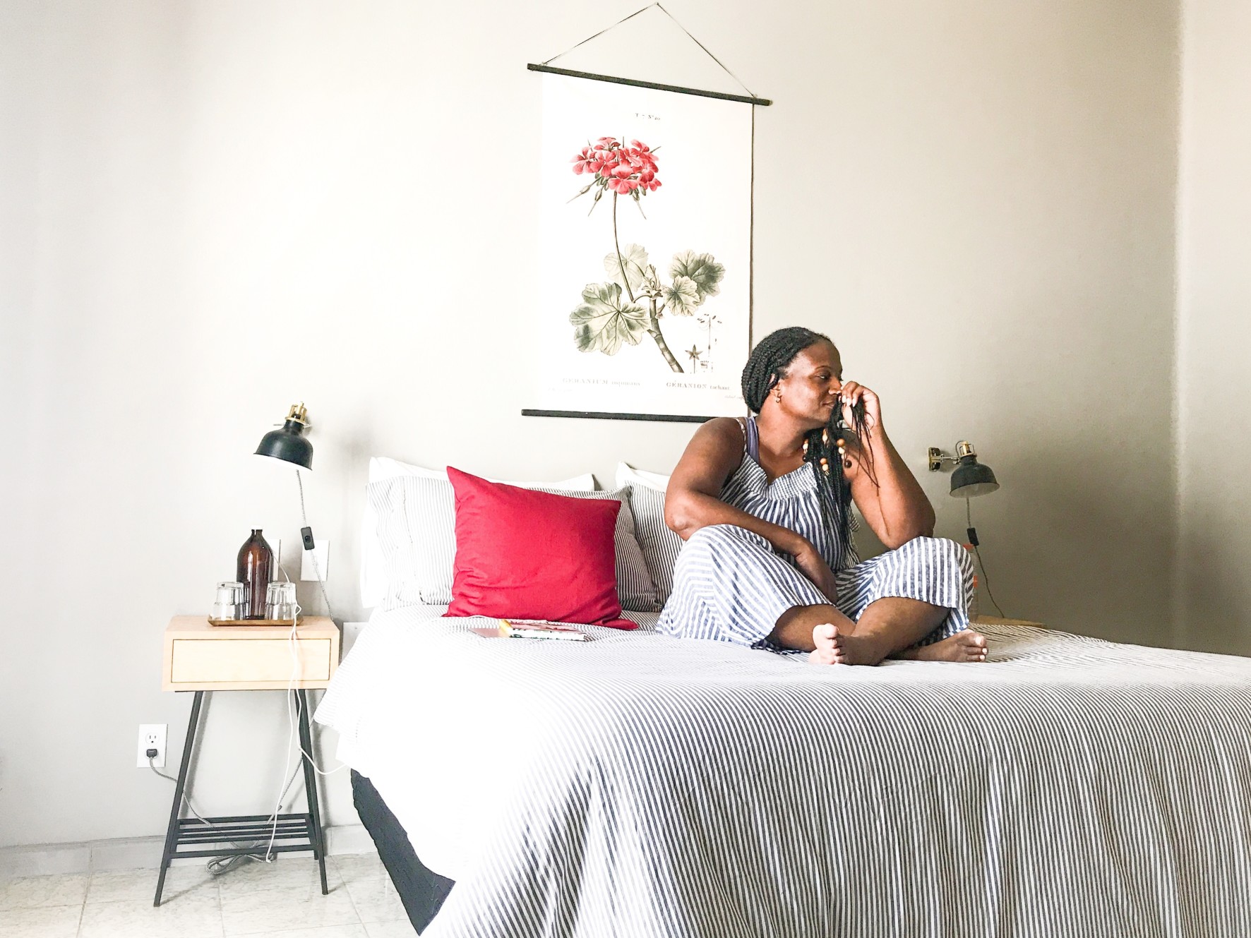 woman-during-quarantine-alone-in-white-and-red-bedroom-thinking-grief-grieving-bed-weekend-saturday_t20_8d3Z0V.jpg