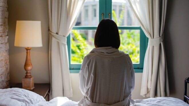 woman-looking-out-window