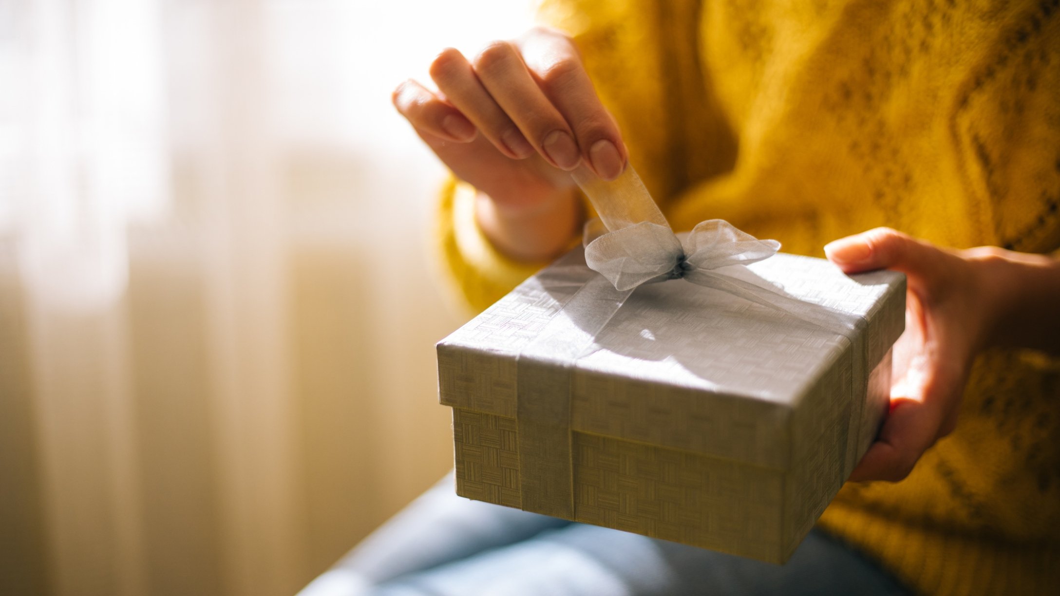 woman-opening-gift