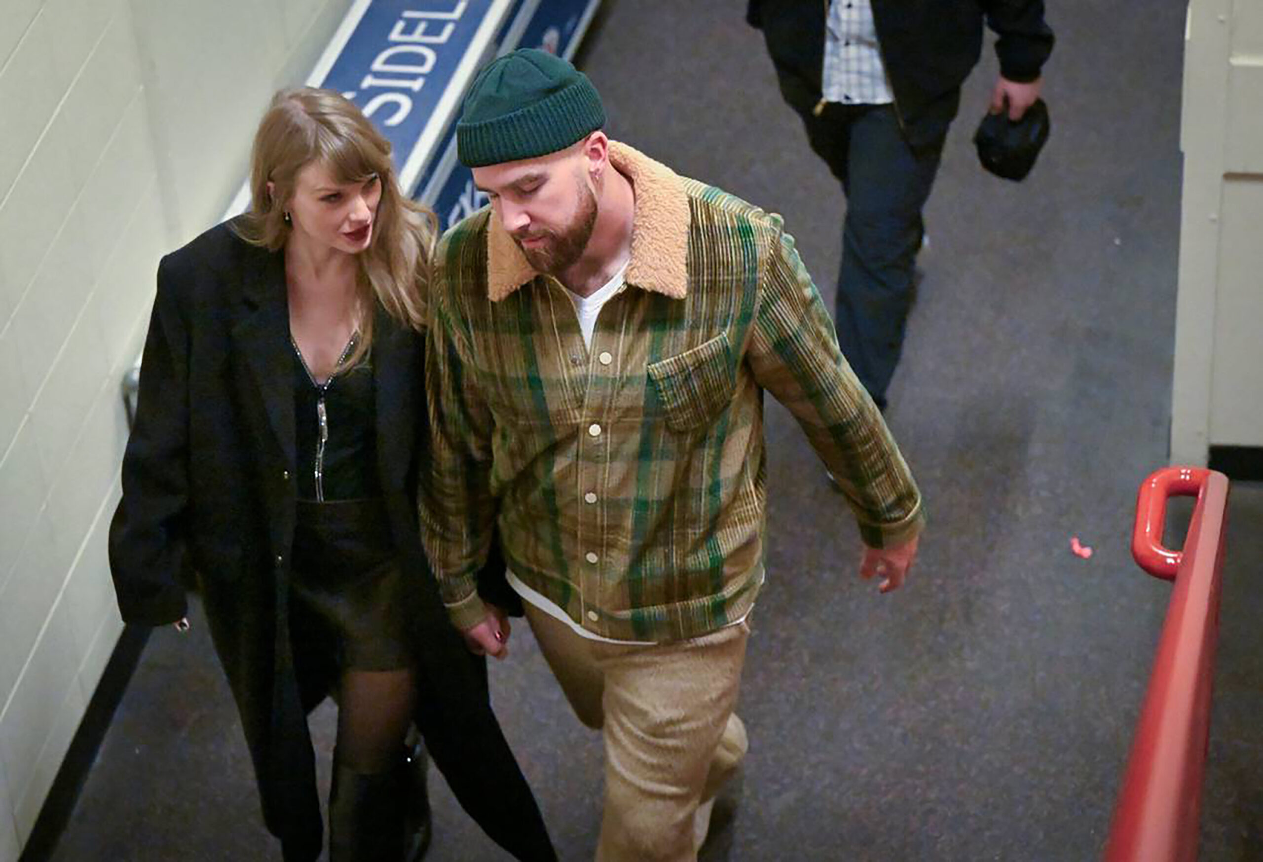 Taylor Swift and Travis Kelce talk as they leave after the Buffalo Bills defeated the Kansas City Chiefs, 20-17, on Sunday, Dec. 10, 2023, at GEHA Field at Arrowhead Stadium in Kansas City. (Tammy Ljungblad/Kansas City Star/TNS)