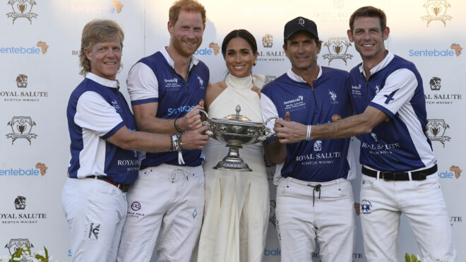 From left, Dana Barnes; Prince Harry, Duke of Sussex; Meghan, Duchess of Sussex; Adolfo Cambiaso and Malcolm Borwick during the Royal Salute Polo Challenge benefiting Sentebale at Grand Champions Polo Club on April 12, 2024, in Wellington, Florida. (Jason Koerner/Getty Images for Sentebale/TNS)