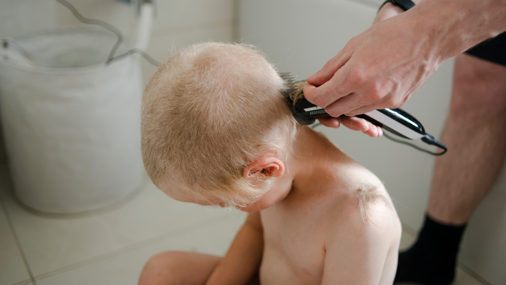 shaving boy's hair