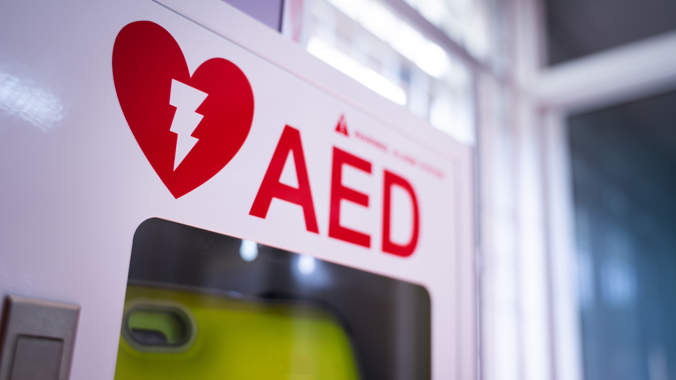 An automated external defibrillator (AED) in a white box is an emergency defibrillator for people in cardiac arrest.