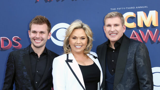 (L-R) Chase Chrisley, Julie Chrisley, and Todd Chrisley attend the 53rd Academy of Country Music Awards at MGM Grand Garden Arena on April 15, 2018 in Las Vegas, Nevada. (Tommaso Boddi/Getty Images/TNS)