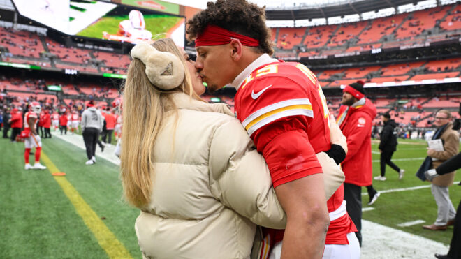 CLEVELAND, OHIO - DECEMBER 15: Patrick Mahomes #15 of the Kansas City Chiefs kisses wife Brittany Mahomes prior to a game against the Cleveland Browns at Huntington Bank Field on December 15, 2024 in Cleveland, Ohio. (Photo by Nick Cammett/Diamond Images via Getty Images)