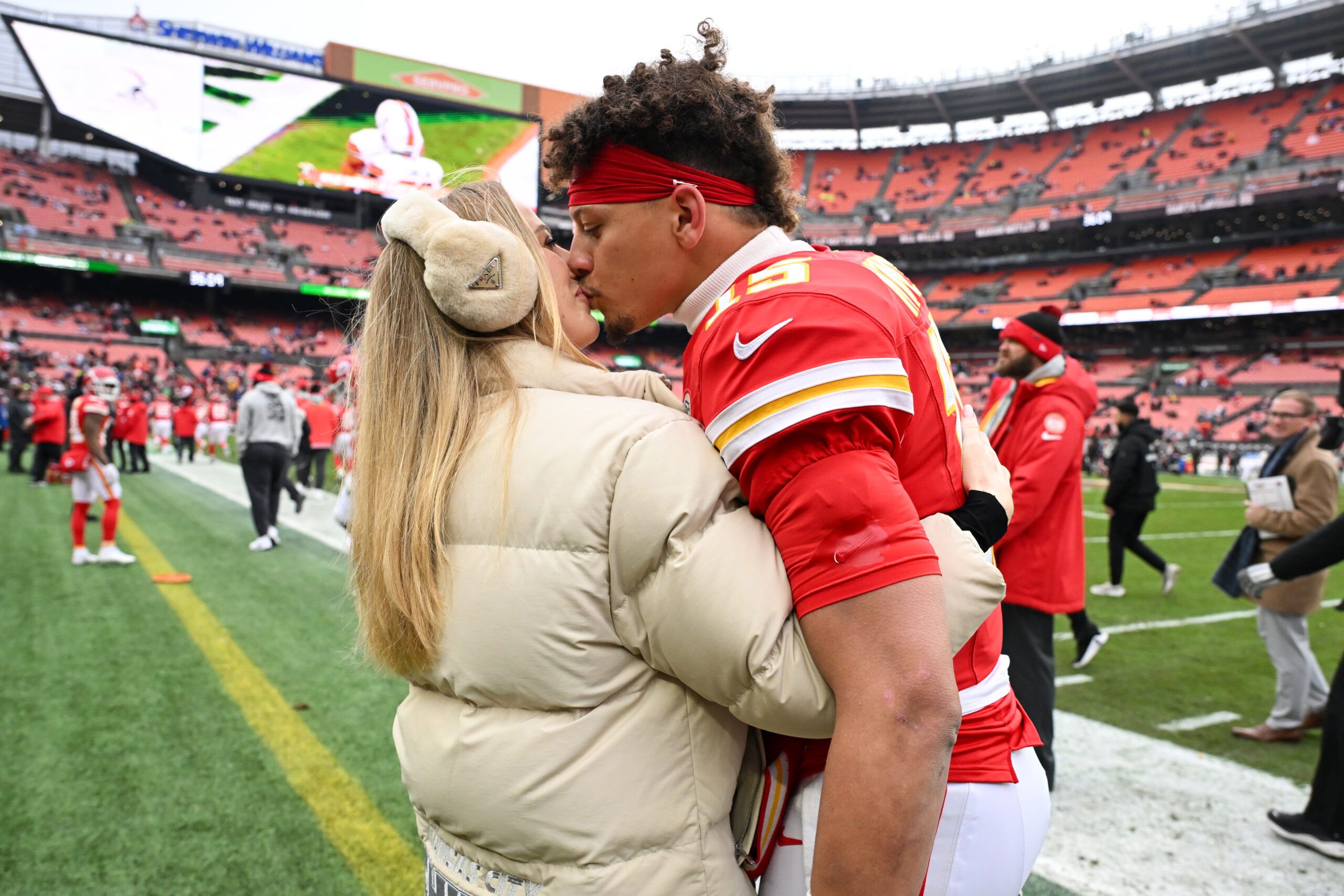 CLEVELAND, OHIO - DECEMBER 15: Patrick Mahomes #15 of the Kansas City Chiefs kisses wife Brittany Mahomes prior to a game against the Cleveland Browns at Huntington Bank Field on December 15, 2024 in Cleveland, Ohio. (Photo by Nick Cammett/Diamond Images via Getty Images)