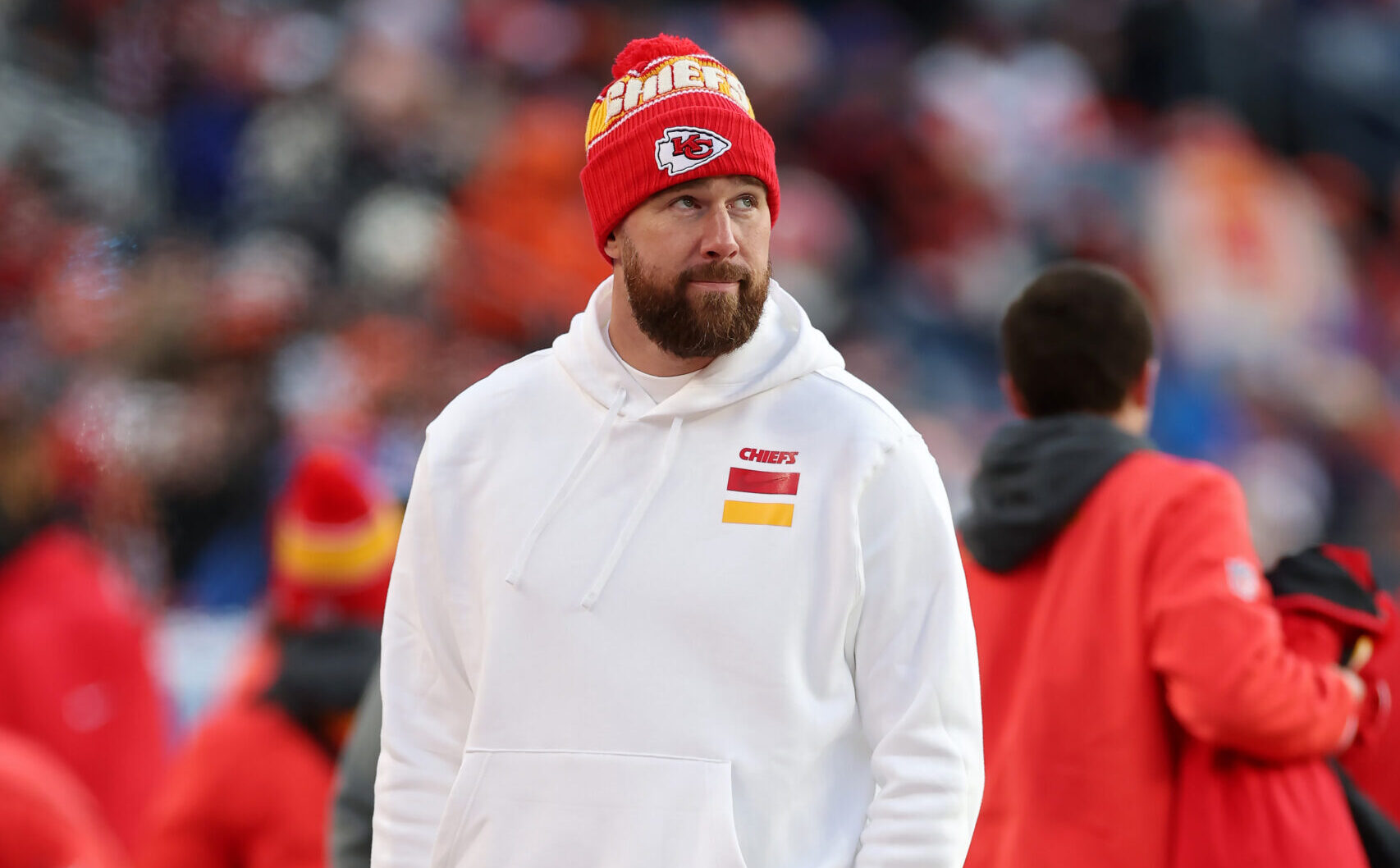 DENVER, COLORADO - JANUARY 05: Travis Kelce #87 of the Kansas City Chiefs looks on from the sideline during the game against the Denver Broncos at Empower Field At Mile High on January 05, 2025 in Denver, Colorado. (Photo by Matthew Stockman/Getty Images)