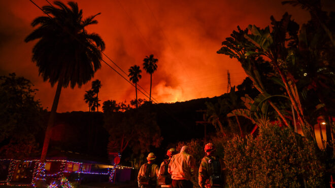 CALIFORNIA, USA - JANUARY 10: A view of wild fire as firefighting planes and helicopters drop water over flames in Mandeville Canyon during 'Palisades Fire' in Los Angeles, California, United States on January 10, 2025. (Photo by Tayfun Coskun/Anadolu via Getty Images)