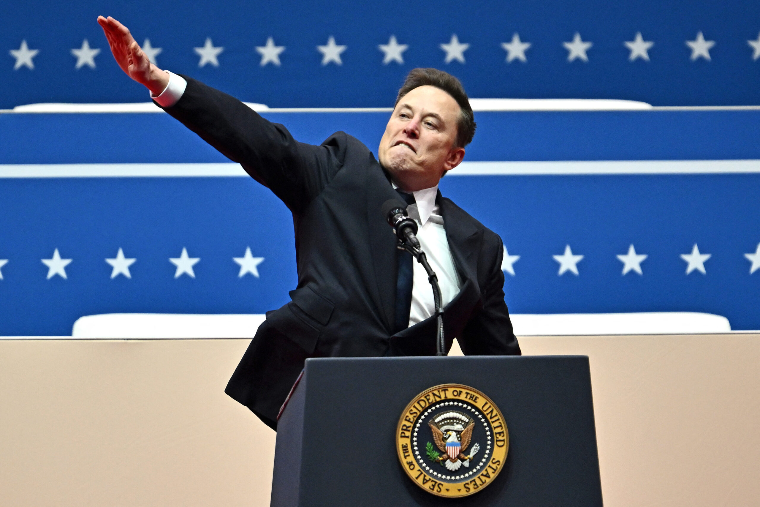 Tesla and SpaceX CEO Elon Musk gestures as he speaks during the inaugural parade inside Capitol One Arena, in Washington, D.C., on Monday, Jan. 20, 2025. (Angela Weiss/AFP/Getty Images/TNS)