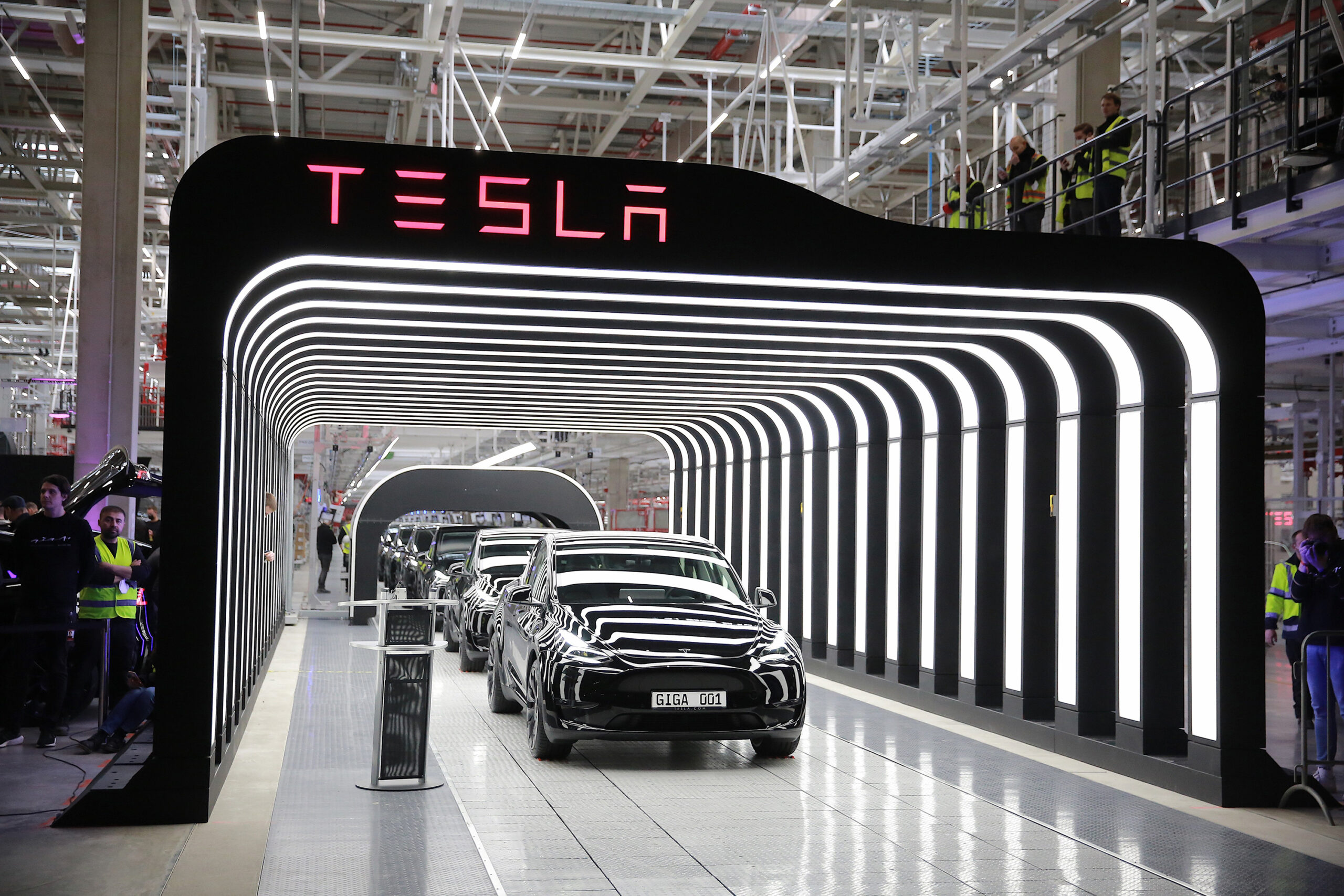 Newly completed Tesla electric cars at the official opening of the new Tesla electric car manufacturing plant on March 22, 2022 near Gruenheide, Germany. (Christian Marquardt/Getty Images/TNS)