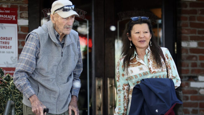 Actor Gene Hackman and his wife, classical pianist Betsy Arakawa, leave a restaurant in Santa Fe, New Mexico, on March 28, 2024. (Imago/Zuma Press/TNS)